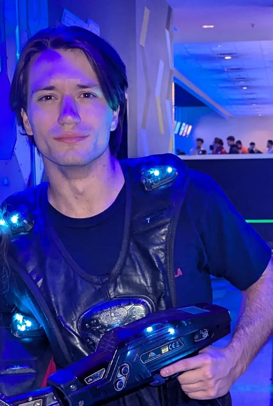 Nolan wearing laser tag gear